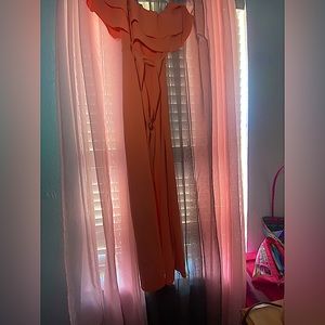 Of selling a jump suit and it’s a size small in women